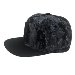 Detail of 3D embroidered R letter and artistic abstract pattern on black snapback hat