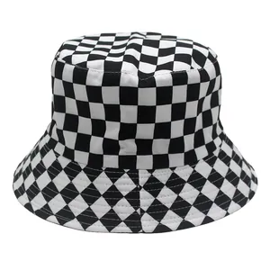 Close-up of the classic black and white checkerboard pattern on the canvas bucket hat