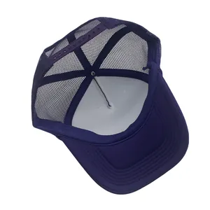 Detail view of purple trucker hat with breathable mesh and adjustable snapback closure