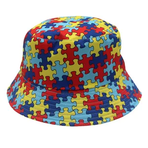 Detailed view of colorful puzzle print bucket hat with reinforced stitching on the brim