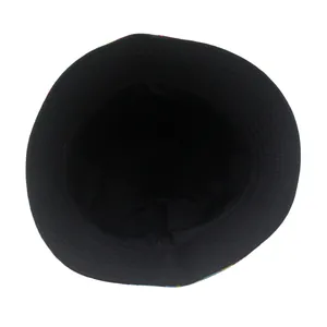 Detailed interior view of a black bucket hat showing reinforced stitching and lining