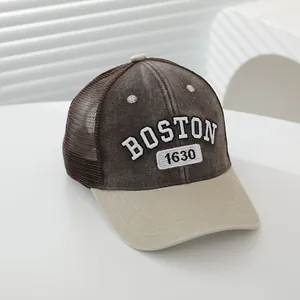 Close-up of vintage Boston kids trucker hat with 3D embroidery and breathable mesh back