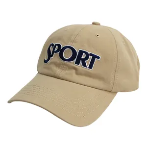 Detail of khaki cotton baseball cap with blue SPORT letter embroidery and white outline
