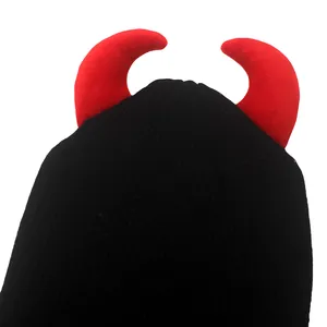 Black knit beanie with red devil horns for outdoor winter warmth and fun parties
