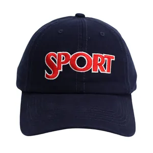 Detailed close-up of embroidered SPORT lettering on the navy blue cotton baseball cap
