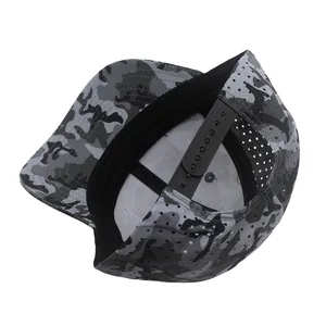 Detail of camouflage baseball cap showing breathable mesh holes and adjustable snapback