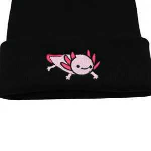 Black knitted beanie hat with pink axolotl embroidery for winter outdoor warmth