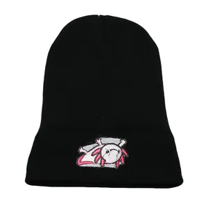 Black knitted beanie featuring a pink cartoon axolotl embroidery for winter warmth