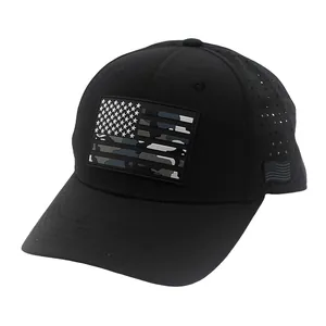 Detail of black tactical baseball cap with camouflage flag patch and laser-cut vent holes