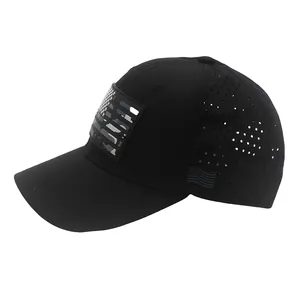 Side view of black tactical baseball cap featuring laser-cut ventilation and camo flag