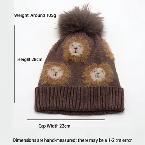 Brown knitted lion hat with fluffy pompom, fleece lining for kids winter warmth