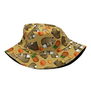 Close-up of cute cartoon capybara print and fruit patterns on a beige bucket hat fabric