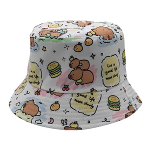 Detail of white bucket hat with Capybara pattern and live a good life meet slowly text
