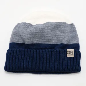 Kids warm knit beanie featuring a three-color block design in white, grey, and navy blue