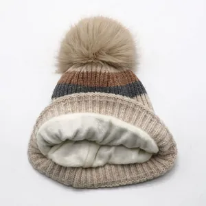 Winter striped knit hat for kids with soft warm fleece lining and a large faux fur pompom