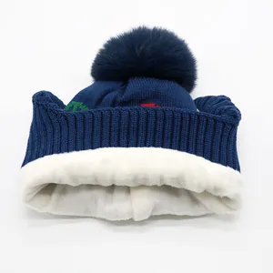 Kids navy knit car hat with faux fur pom and thick thermal fleece lining for winter