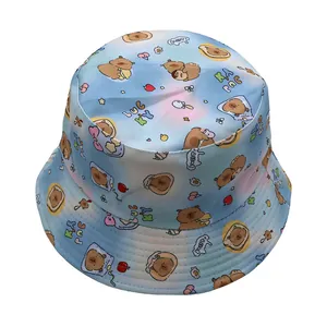 Detailed view of the Capybara cartoon pattern and stitching on a pastel reversible bucket hat