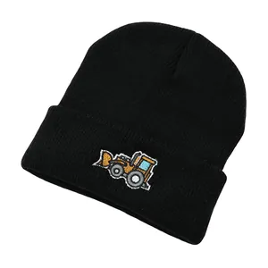 Bonnet en maille noire pour enfants avec broderie colorée de pelleteuse de chantier