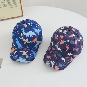 Kids baseball cap featuring colorful cartoon dinosaur prints in bright blue and purple