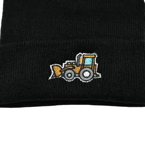 Bonnet en tricot noir pour enfants avec broderie de pelleteuse jaune sur le revers
