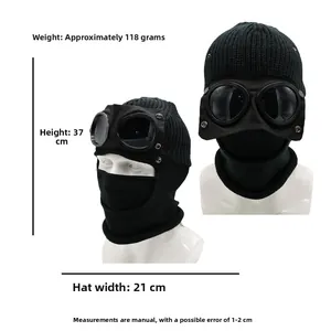 Detail view of winter knitted balaclava with integrated goggles and dimensions 37x21cm
