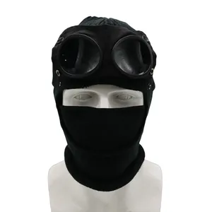 Black knit thermal mask beanie with integrated goggles and neck gaiter for winter