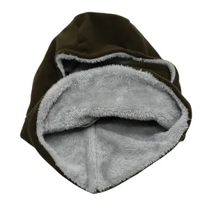 Detail of windproof winter hood with thick dark brown fleece and grey plush lining