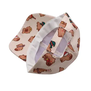 Detail of adjustable strap and capybara cartoon print on kids baseball cap