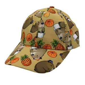 Detailed pattern of cute cartoon capybara illustrations on a beige cotton baseball cap