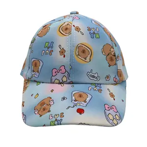 Detailed view of Capybara print on light blue and pink gradient kids cotton baseball cap