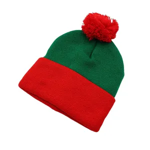 Christmas color block beanie with pom-pom in red and green knit, festive winter style