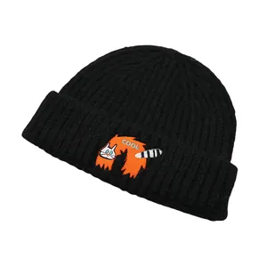 Black ribbed knit beanie with cute cat embroidery and orange cool text patch