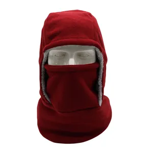 Detail of warm burgundy fleece balaclava with soft grey plush lining and face cover