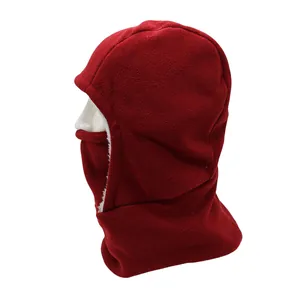 Close-up of red winter balaclava showing thick white fleece lining and soft texture
