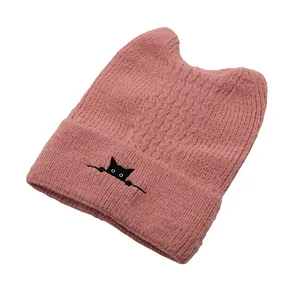 Dusty rose knitted beanie with cat ears and detailed cat embroidery for winter