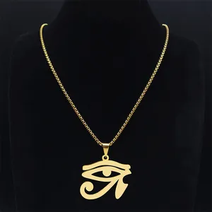 Detailed macro view of golden Eye of Horus pendant on a box chain over a black neck bust