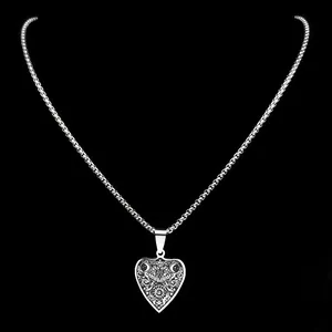 Gothic heart pendant necklace with celestial sun and moon engravings in silver steel