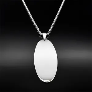 Polished silver stainless steel oval pendant necklace detail with smooth blank surface