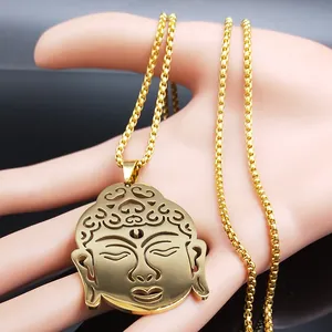 Detailed view of hollow-carved gold Buddha head pendant with delicate bead chain necklace