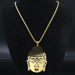 Golden hollowed-out Buddha pendant necklace displayed on a black neck bust stand
