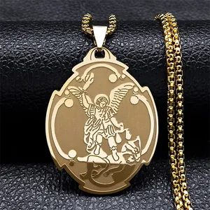 Detailed macro view of golden Saint Michael archangel relief pendant on black leather