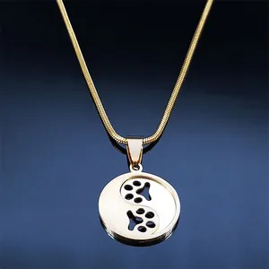 Golden yin yang necklace with cute dog paw print pendant on smooth snake chain