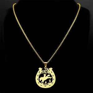 Golden stainless steel box chain necklace featuring a western horseshoe pendant with rider