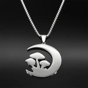 Polished silver crescent moon necklace with intricate red mushroom charms and metal chain