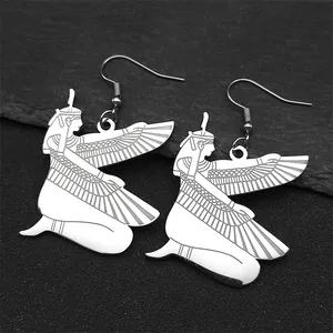 Detail view of silver Egyptian Isis goddess earrings with intricate wing engravings