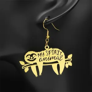 Gold sloth spirit animal earrings featuring hanging sloth on branch design for women