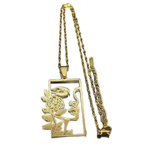 Collier en acier inoxydable doré avec pendentif rectangulaire creux portrait rose et visage