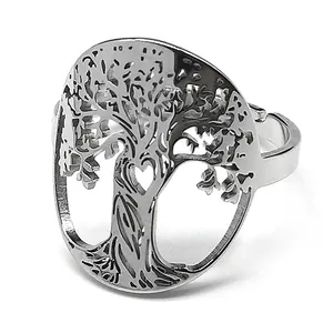 Adjustable stainless steel tree of life ring with hollow heart design on white background