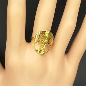 Adjustable golden stainless steel open ring with a hollow Tree of Life design