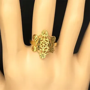 Vintage hollow flower of life gold ring in stainless steel for women on hand model